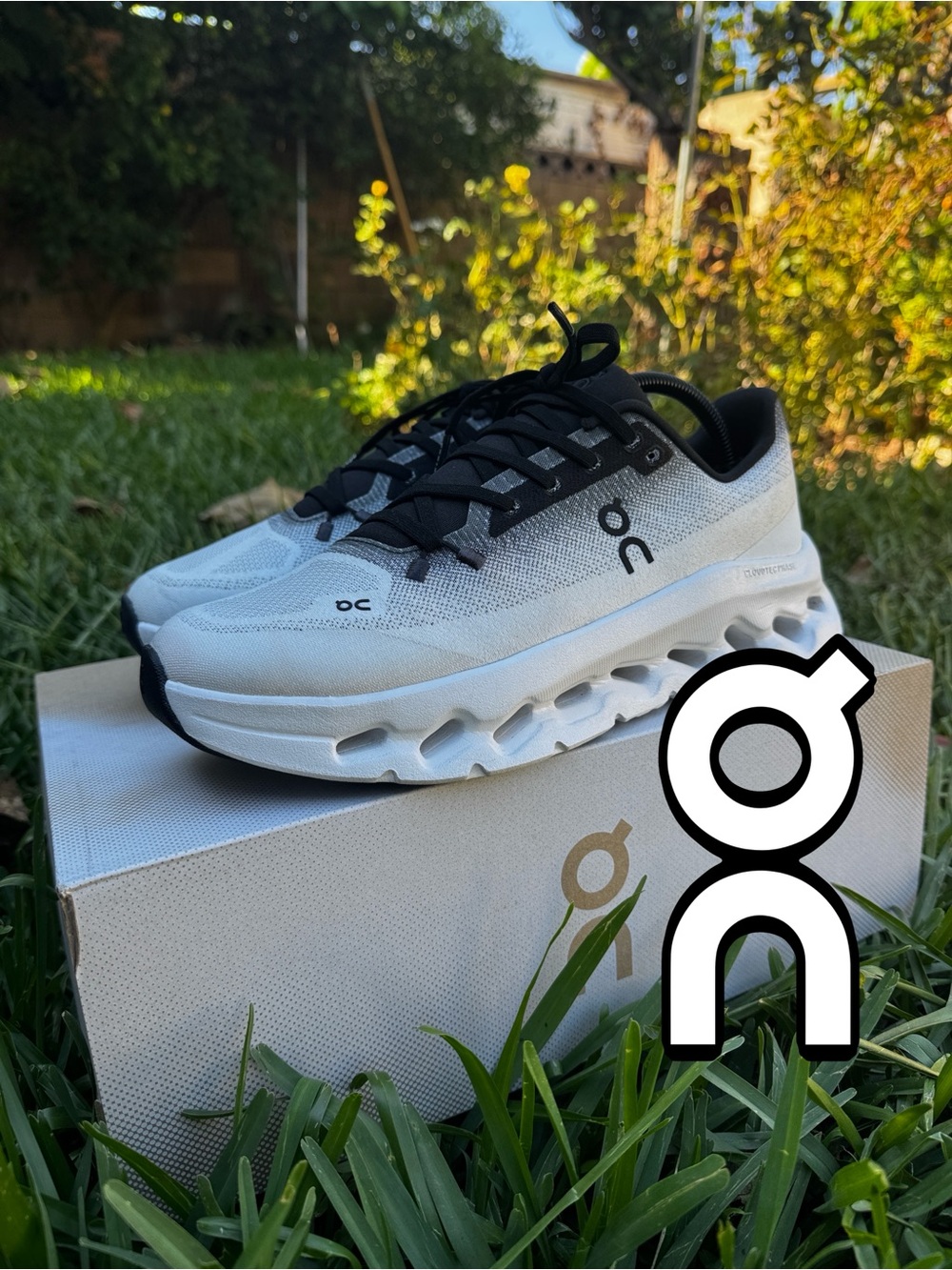 On Running Cloudtilt running shoes - black / ivory / white 
(M 9.5 / W 11)